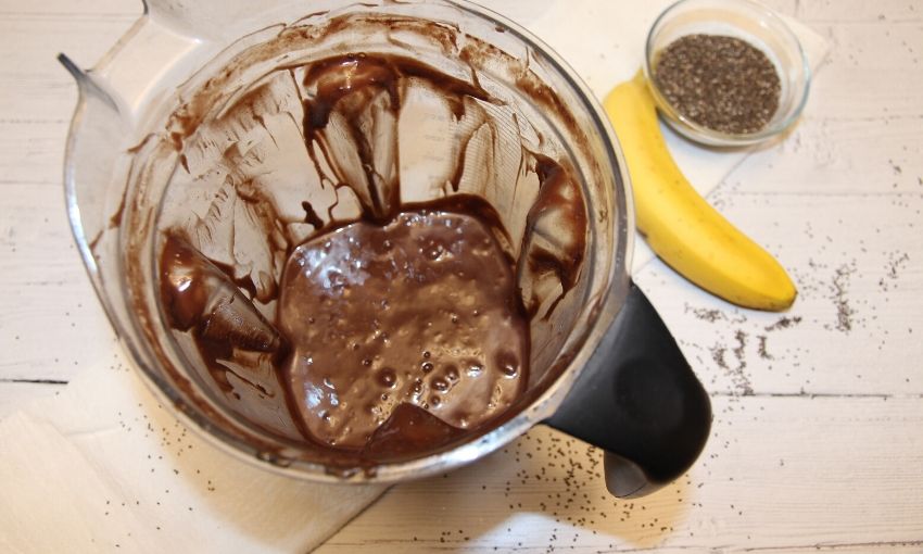 adding Chocolate Chia Seed Pudding ingredients into blender