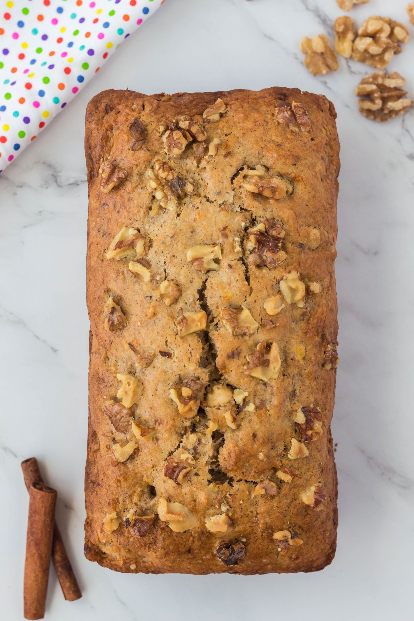 This is the Best Vegan Banana Bread recipe ever! A little bit sweet, moist, and with a hint of vanilla this Vegan Banana Bread Recipe will be your new go-to recipe! #veganbananabread #veganquickbread #veganbaking #eggfreebananabread