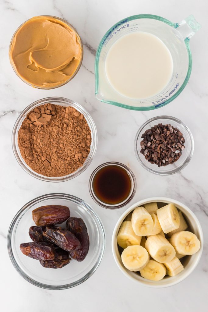 Ingredients to make chocolate peanut butter smoothie.