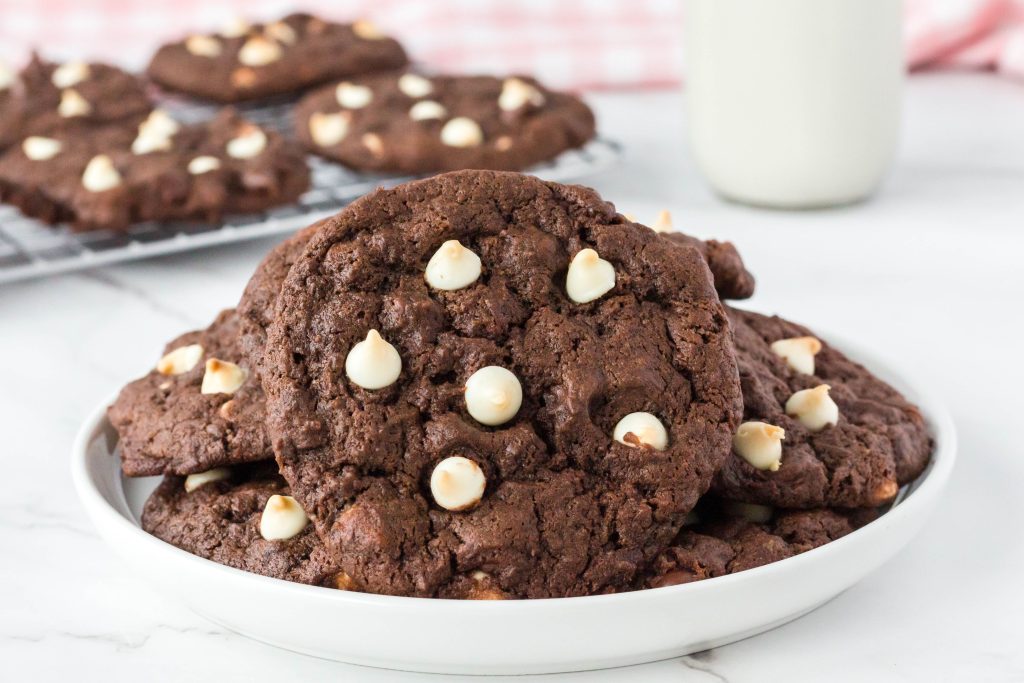 Vegan double chocolate chip cookies on a plate ready to enjoy!