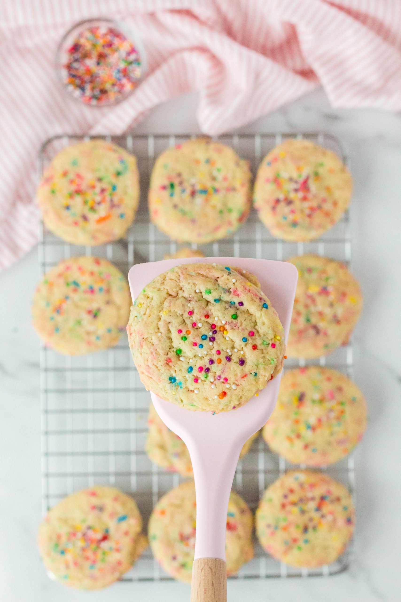 Soft, chewy, and filled with sprinkles these Vegan Funfetti Cookies will be a huge hit with all! They're made in one bowl and ready to enjoy in less than 20 minutes!