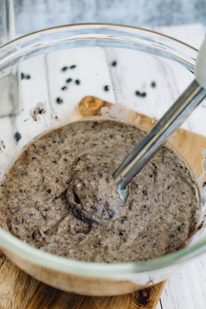 Blend ingredients to make black bean brownie batter.