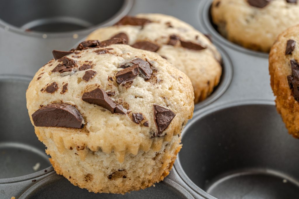 Baked vegan chocolate chip muffins up close. 