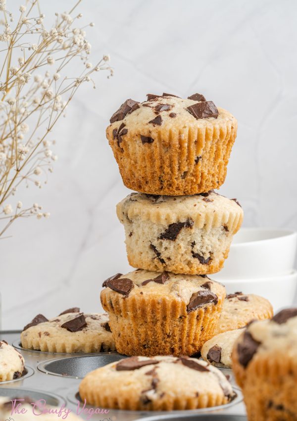 Three vegan chocolate chip muffins stacked