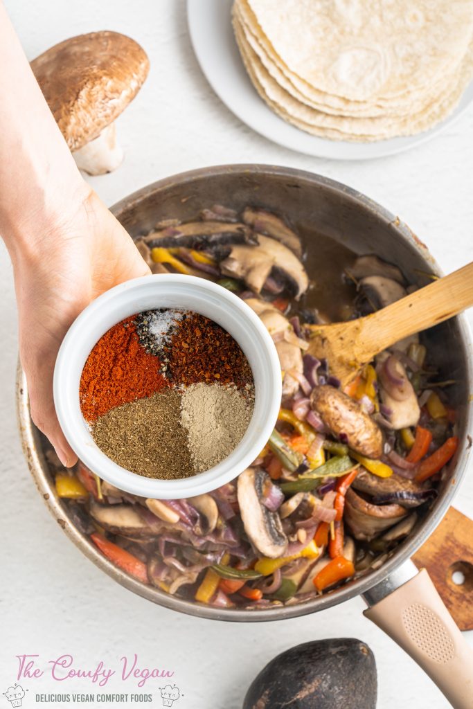 A bowl full of spices added to the veggies
