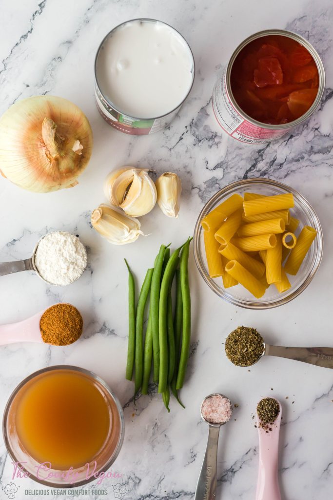Ingredients to make vegan creamy cajun pasta