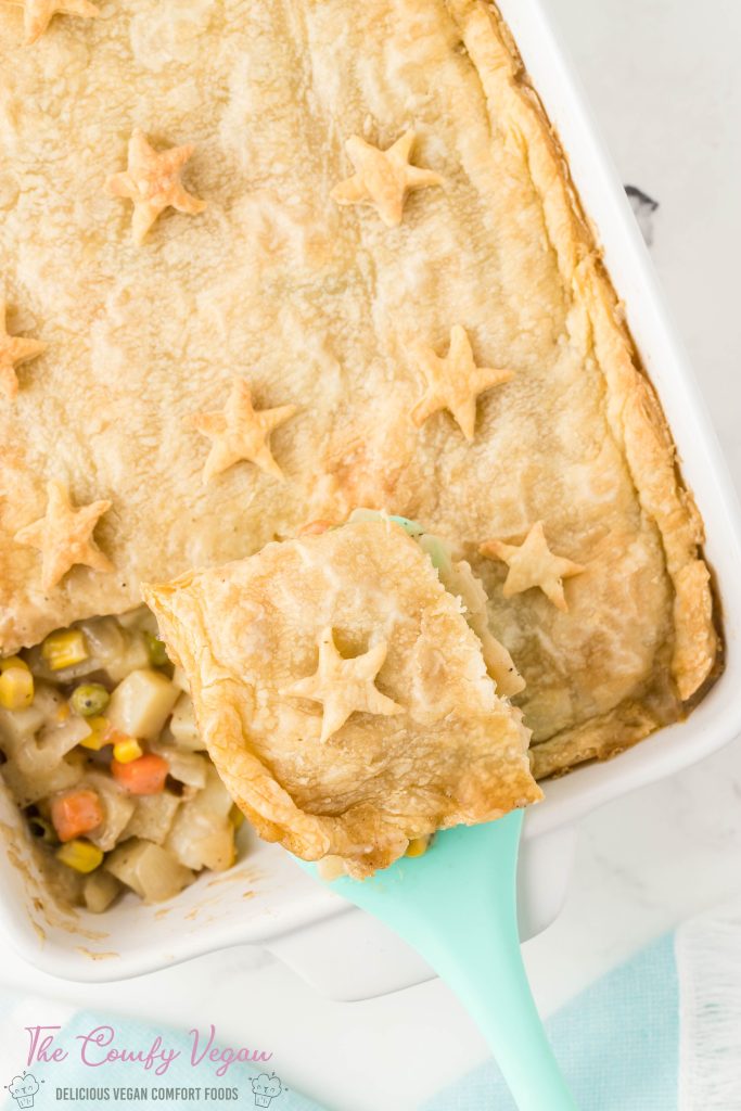 Vegan pot pie with a slice taken out.