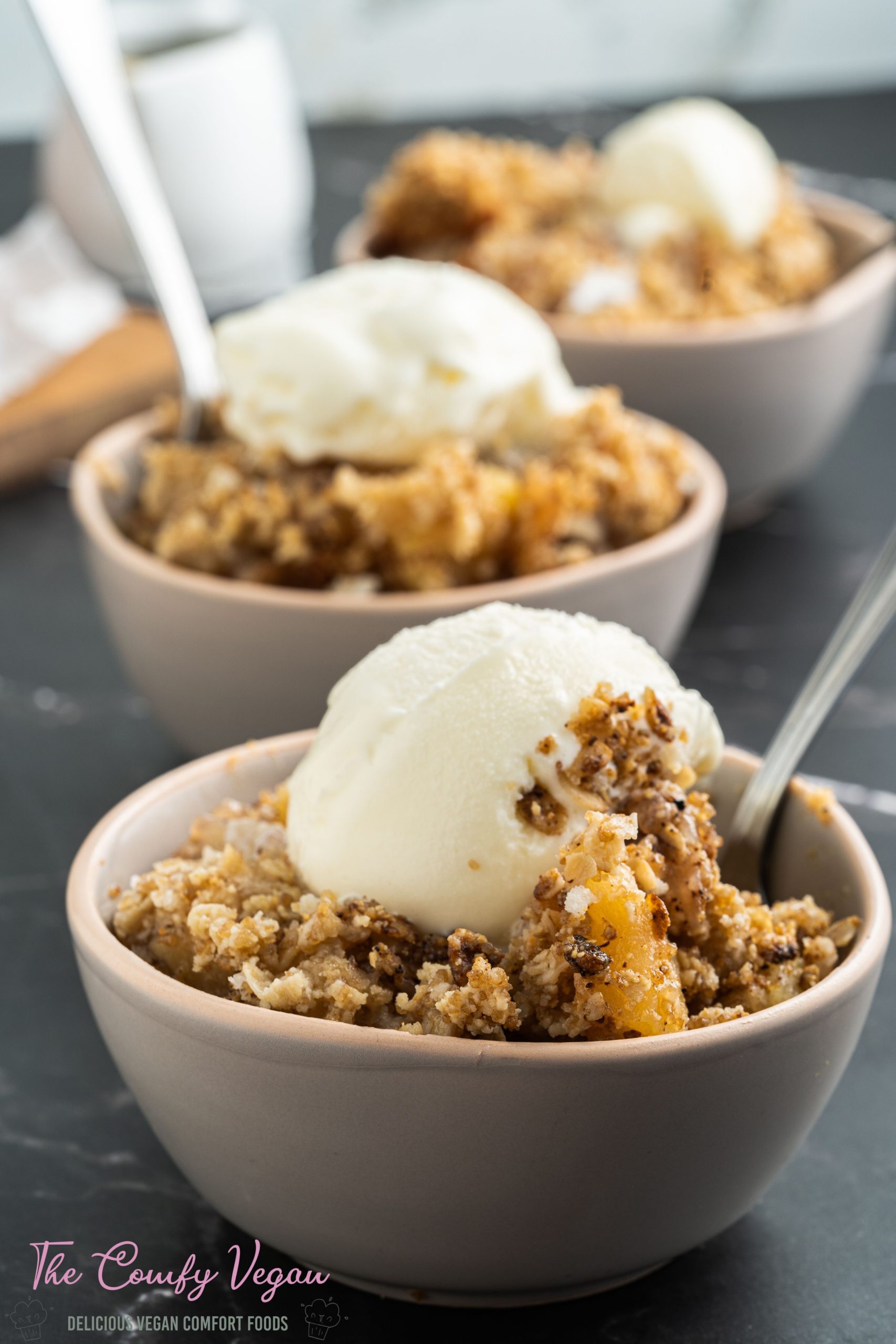 Vegan Gluten-Free Apple Crisp is a go-to fall dessert that you can make with just a few ingredients! Top with your favorite vegan vanilla ice cream to take this comforting dessert to the next level. Easy to make this apple crisp recipe is gluten-free and vegan which makes it suitable for almost every occasion!