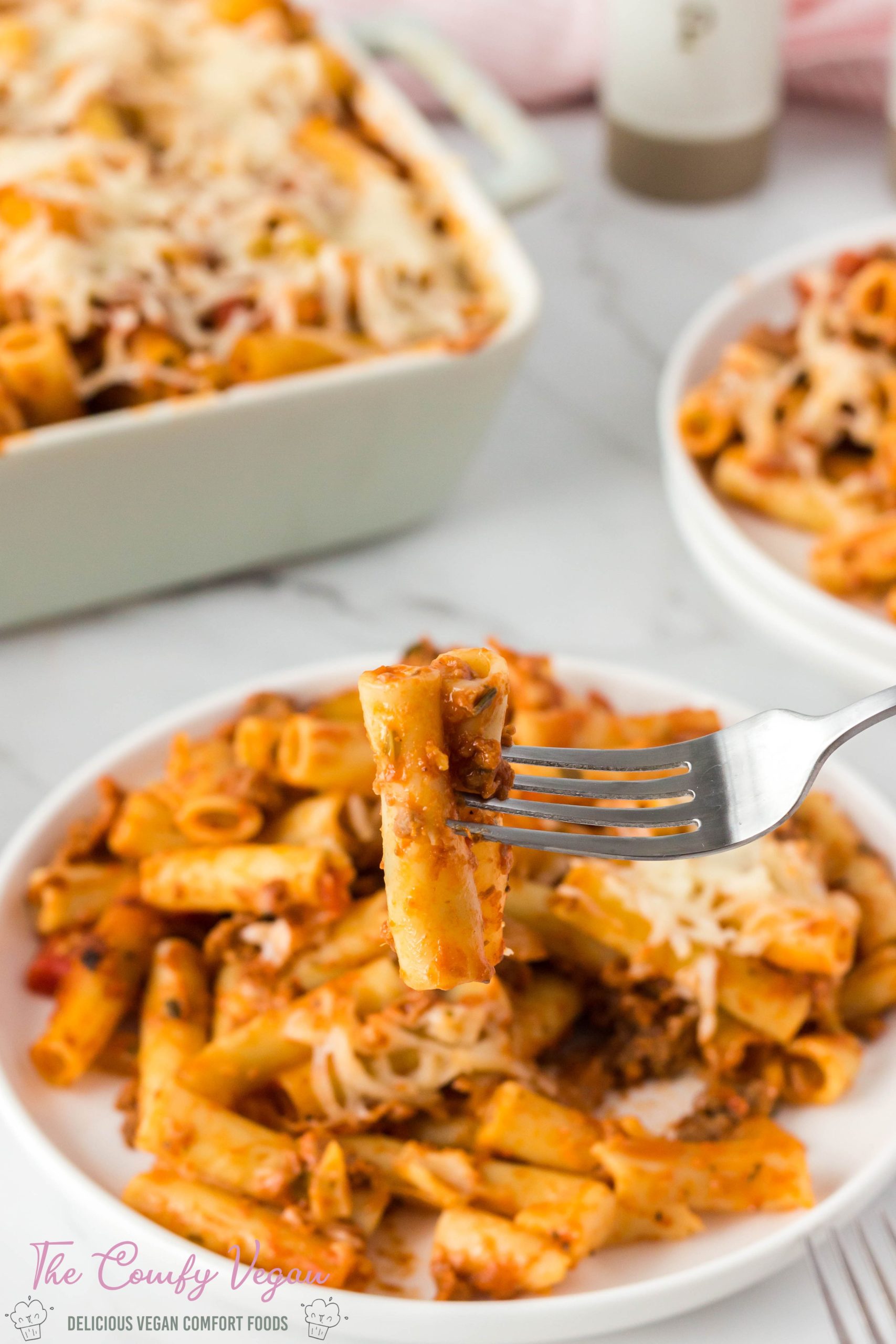 Vegan Baked Ziti is an easy and quick dinner that is ready to enjoy in just 25 minutes. This 6-ingredient pasta dinner recipe is a filling option that the whole family will love. Serve alongside some Vegan Dinner Rolls and Vegan Caesar Salad for a dinner that will feed a crowd.