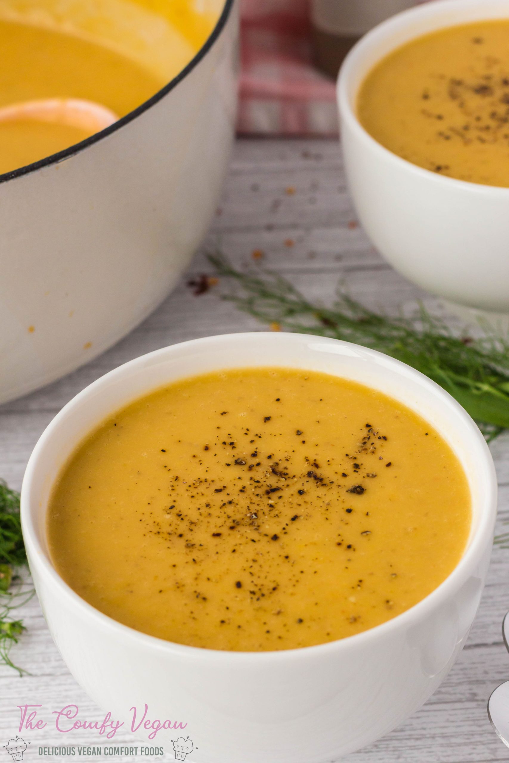 Comforting, creamy and so delicious this Vegan Fennel Soup recipe is perfect on a cold day! Made with potatoes, fennel, and other veggies this roasted fennel soup is big on flavor. Serve with some delicious vegan dinner rolls to feed a crowd.