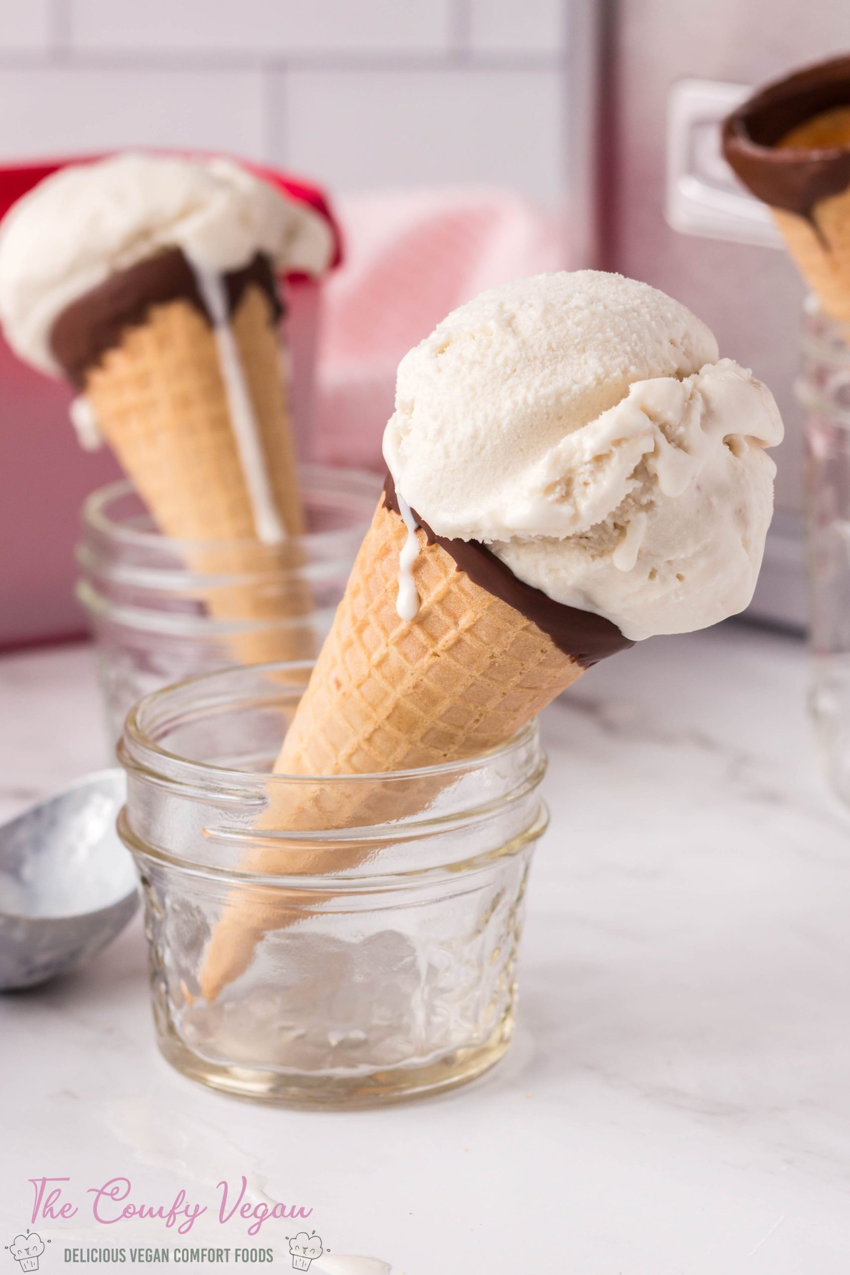 The easiest Vegan Vanilla Ice Cream recipe ever! Made with or without an ice cream maker this vegan ice cream recipe uses just 3 ingredients. It's creamy, just sweet enough, and will save you tons of money at the store making it at home. Use in a cone, in a bowl, or on top of your favorite dessert, this ice cream recipe is amazing!
